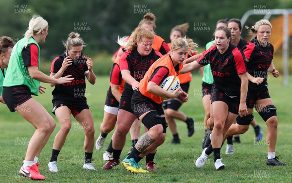 220822 - Wales Women Rugby in Canada - Bethan Lewis charges forward during the first Wales Women training session at their training base just outside Halifax