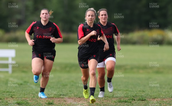 220822 - Wales Women Rugby in Canada - Gwenllian Pyrs, Elinor Snowsill and Siwan Lillicrap during the first Wales Women training session at their training base just outside Halifax
