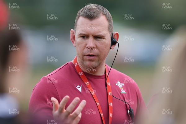 230424 - Wales Women Rugby Training - Ioan Cunningham, Wales Women head coach, during training ahead of Wales’ Guinness Women’s 6 Nations match against Italy