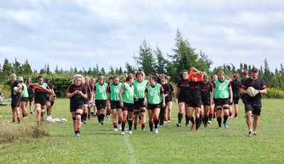 230822 - Wales Women rugby squad players during a training session against the Canadian Women’s rugby squad near Halifax