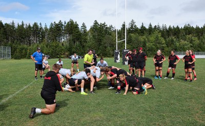 230822 - Wales Women Rugby Training Session - Players and management look on as Wales and Canada train against each other ahead of their match this weekend