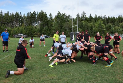 230822 - Wales Women Rugby Training Session - Players and management look on as Wales and Canada train against each other ahead of their match this weekend