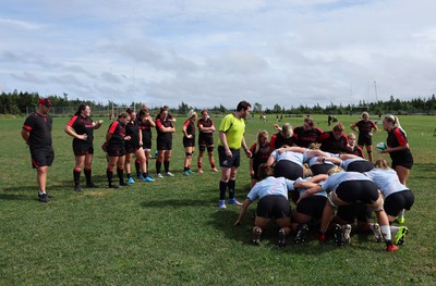 230822 - Wales Women Rugby Training Session - Players and management look on as Wales and Canada train against each other ahead of their match this weekend