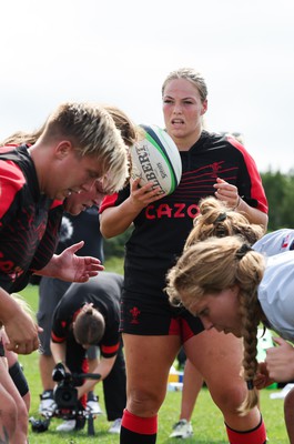 230822 - Wales Women Rugby Training Session - Wales’ Kelsey Jones acts as scrum half as Wales and Canada train against each other ahead of their match this weekend