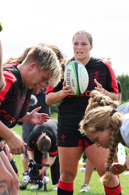 230822 - Wales Women Rugby Training Session - Wales’ Kelsey Jones acts as scrum half as Wales and Canada train against each other ahead of their match this weekend