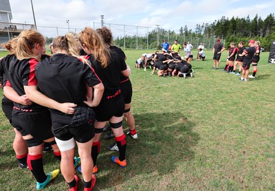 230822 - Wales Women Rugby Training Session - Players and management look on as Wales and Canada train against each other ahead of their match this weekend