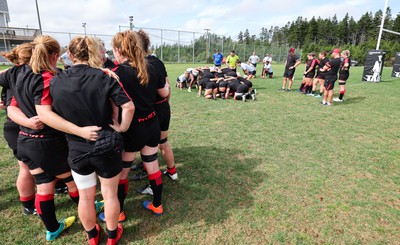 230822 - Wales Women Rugby Training Session - Players and management look on as Wales and Canada train against each other ahead of their match this weekend