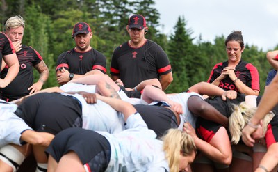 230822 - Wales Women Rugby Training Session - Wales’ head coach Ioan Cunningham looks on during a training session against Canada ahead of their match this weekend