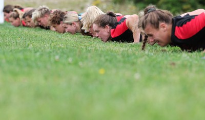 230822 - Wales Women Rugby Training Session - Wales’ players warm down during a training session against Canada ahead of their match this weekend