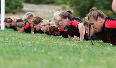 230822 - Wales Women Rugby Training Session - Wales’ players warm down during a training session against Canada ahead of their match this weekend