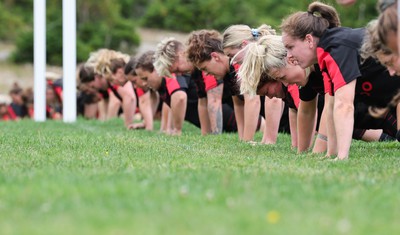 230822 - Wales Women Rugby Training Session - Wales’ players warm down during a training session against Canada ahead of their match this weekend