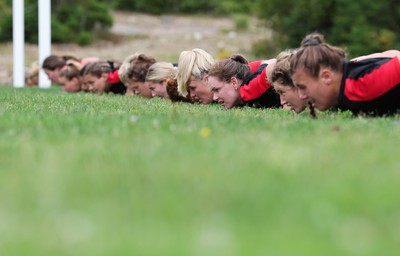 230822 - Wales Women Rugby Training Session - Wales’ players warm down during a training session against Canada ahead of their match this weekend