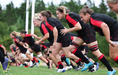 230822 - Wales Women Rugby Training Session - Wales’ players warm down during a training session against Canada ahead of their match this weekend