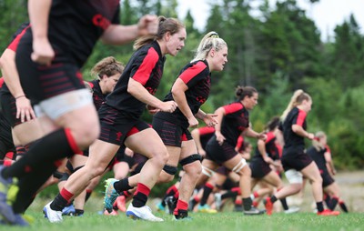 230822 - Wales Women Rugby Training Session - Wales’ players warm down during a training session against Canada ahead of their match this weekend