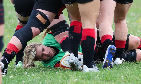 230822 - Wales Women Rugby Training Session - Wales’ Beth Lewis lays the ball back during a training session against the Canadian Women’s rugby squad near Halifax