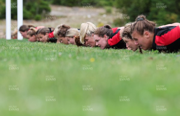 230822 - Wales Women Rugby Training Session - Wales’ players warm down during a training session against Canada ahead of their match this weekend