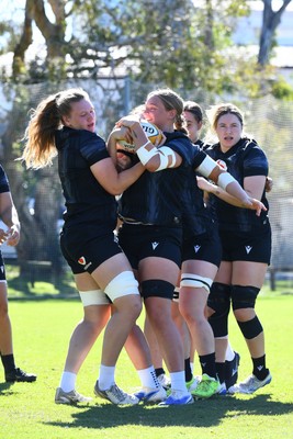 240725 - Wales Women Rugby Training at The Southport School, Southport - Alaw Pyrs and Tilly Vucaj during a Wales Womens Rugby training session ahead of their first tour match against Australia