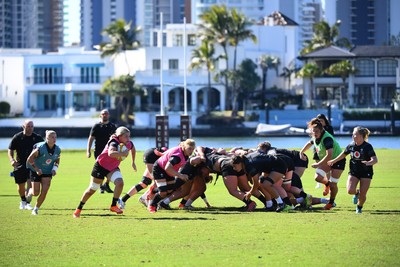 240725 - Wales Women Rugby Training at The Southport School, Southport - Alex Callender breaks away during a Wales Womens Rugby training session ahead of their first tour match against Australia