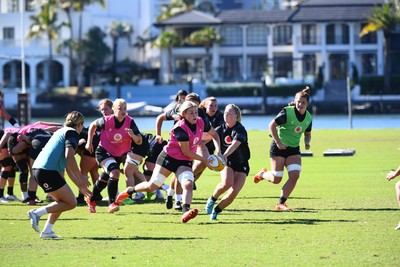 240725 - Wales Women Rugby Training at The Southport School, Southport - Alex Callendertakes on Seren Lockwood during a Wales Womens Rugby training session ahead of their first tour match against Australia