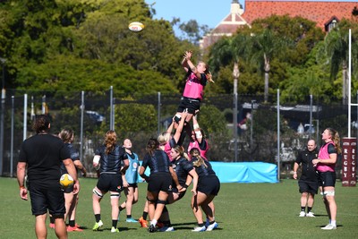 240725 - Wales Women Rugby Training at The Southport School, Southport - Bethan Lewis takes the line out during a Wales Womens Rugby training session ahead of their first tour match against Australia
