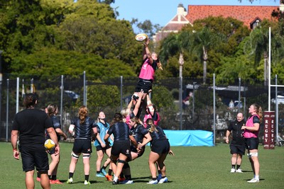 240725 - Wales Women Rugby Training at The Southport School, Southport - Bethan Lewis takes the line out during a Wales Womens Rugby training session ahead of their first tour match against Australia