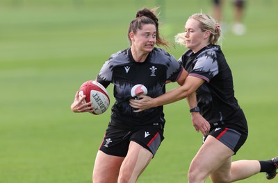 240823 - Wales Women Training session - Robyn Wilkins is tackled by Meg Webb during training session