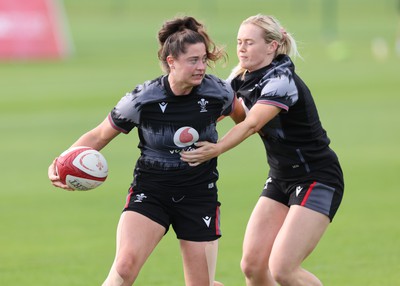 240823 - Wales Women Training session - Robyn Wilkins is tackled by Meg Webb during training session