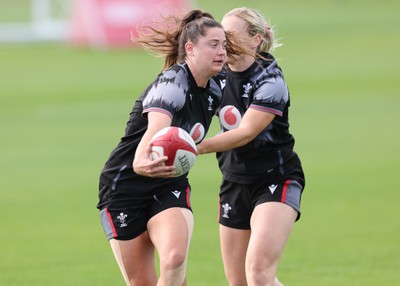 240823 - Wales Women Training session - Robyn Wilkins is tackled by Meg Webb during training session