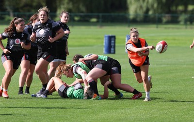 240823 - Wales Women Training session - Keira Bevan feeds the ball out during training session