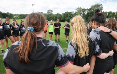 240823 - Wales Women Training session - The team huddle together at the end of the training session