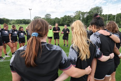 240823 - Wales Women Training session - The team huddle together at the end of the training session