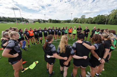 240823 - Wales Women Training session - The team huddle together at the end of the training session