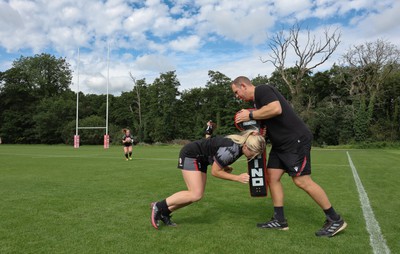 240823 - Wales Women Training session - Ioan Cunningham works with Meg Webb at the end of the session