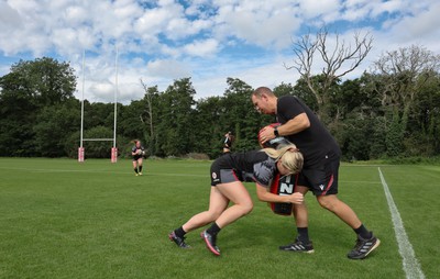 240823 - Wales Women Training session - Ioan Cunningham works with Meg Webb at the end of the session