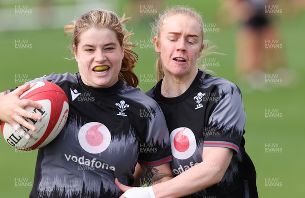 240823 - Wales Women Training session - Bethan Lewis is tackled by Cath Richards during training session