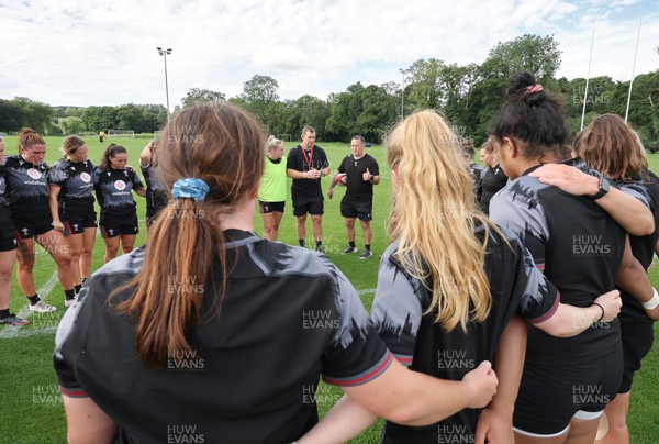 240823 - Wales Women Training session - The team huddle together at the end of the training session