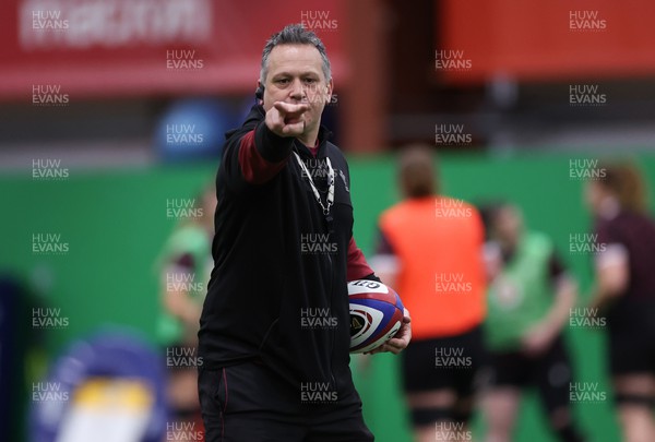 250324 - Wales Women Rugby Training Session  - Shaun Connor, Wales Women attack coach, during training session ahead of the Guinness Women’s 6 Nations match against England