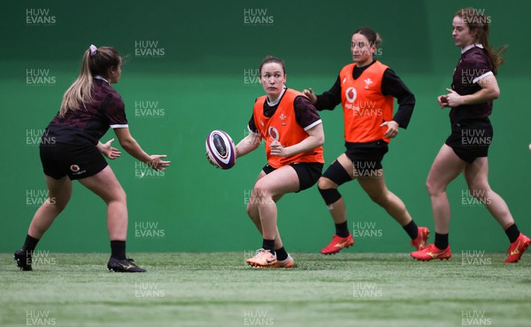 250324 - Wales Women Rugby Training Session  - Jenny Hesketh, Jasmine Joyce and Lisa Neumann during training session ahead of the Guinness Women’s 6 Nations match against England