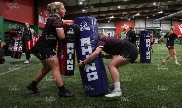 250324 - Wales Women Rugby Training Session  - Molly Reardon, left, and Courtney Keight during training session ahead of the Guinness Women’s 6 Nations match against England