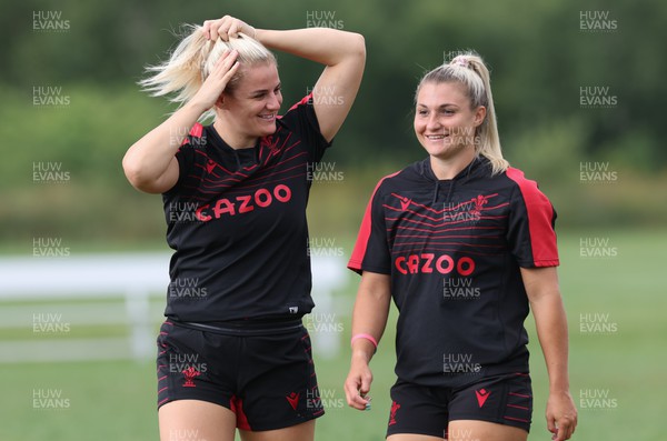 250822 - Wales Women Rugby Training Session - Carys Williams-Morris, left and Lowri Norkett during a training session ahead of the match against Canada