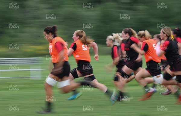 250822 - Wales Women Rugby Training Session - Team members go through sprint sessions during a training session ahead of the match against Canada