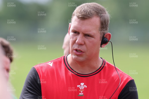 250822 - Wales Women Rugby Training Session - Wales Women head coach Ioan Cunningham during a training session ahead of the match against Canada