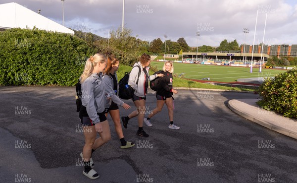 250923 - Wales Women Training Camp, North Wales - Meg Webb, Niamh Terry, Natalia John and Alex Callender arrive for a training session at Stadium CSM in north Wales