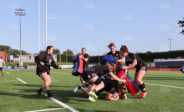 250923 - Wales Women Training Camp, North Wales - The forward pack drive ahead during a units training session at Stadium CSM in north Wales