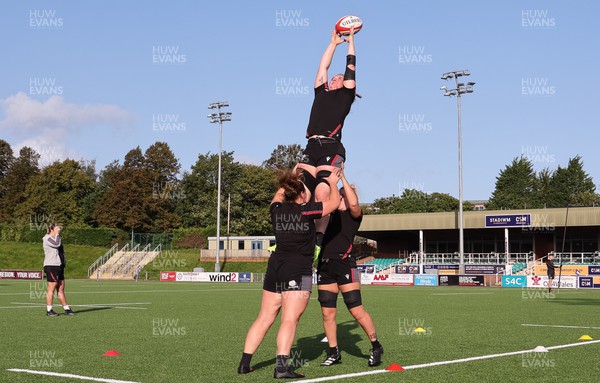250923 - Wales Women Training Camp, North Wales - Abbie Fleming takes a line out during a units training session at Stadium CSM in north Wales