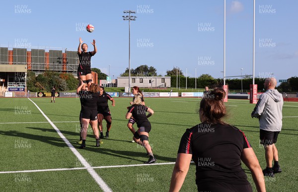 250923 - Wales Women Training Camp, North Wales - Carys Phillips throws in to the line out during a units training session at Stadium CSM in north Wales