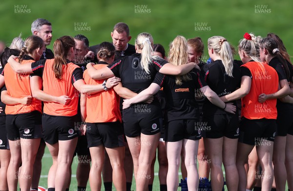 250923 - Wales Women Training Camp, North Wales - The team huddle up during a units training session at Stadium CSM in north Wales