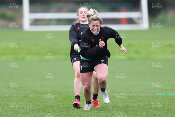 260324 - Wales Women Rugby Training Session - Hannah Bluck and Jenny Hesketh during a training session   ahead of their 6 Nations match against England
