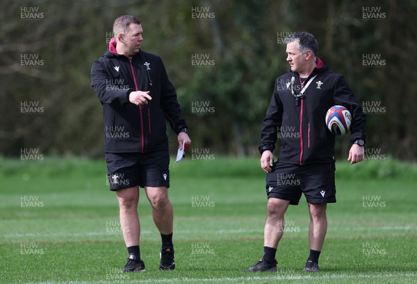 260324 - Wales Women Rugby Training Session - Ioan Cunningham, Wales Women head coach with Shaun Connor, Wales Women attack coach, during a training session   ahead of their 6 Nations match against England