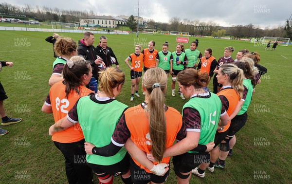 260324 - Wales Women Rugby Training Session - The Wales Women’s team huddle up during a training session   ahead of their 6 Nations match against England